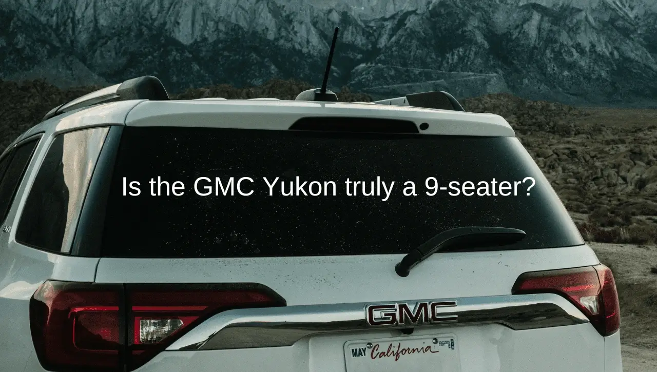 White GMC Yukon SUV parked with mountain landscape showcasing 9-seater capacity