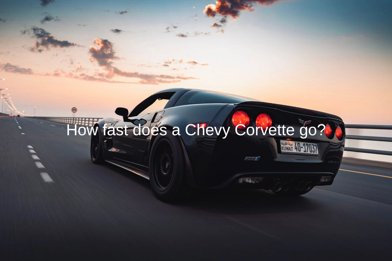 Black Chevy Corvette sports car speeding on highway at sunset showcasing high performance