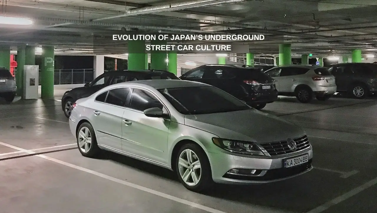 Silver sedan in underground parking garage representing Japan's street car culture evolution