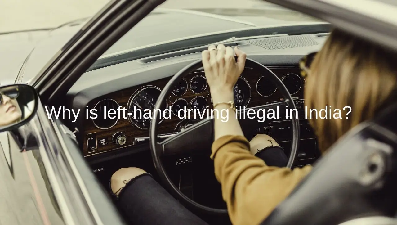 Person driving a left-hand drive muscle car interior with vintage dashboard exploring driving regulations in India