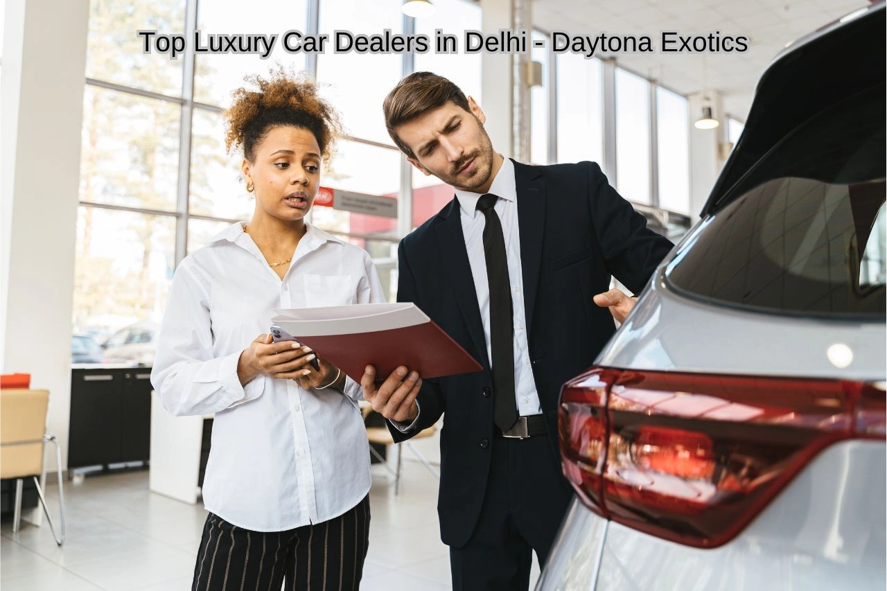 Professional car dealer consultation at Daytona Exotics showroom discussing top luxury car dealers in Delhi