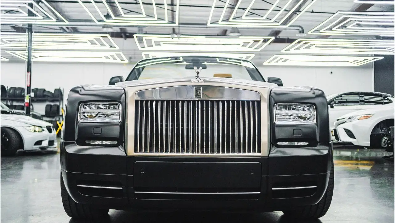 Black Rolls Royce Phantom luxury sedan in showroom unleashing American dream of owning muscle car in India
