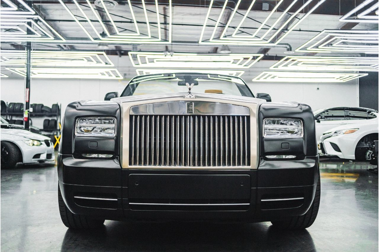 Black Rolls Royce Phantom luxury sedan in showroom unleashing American dream of owning muscle car in India
