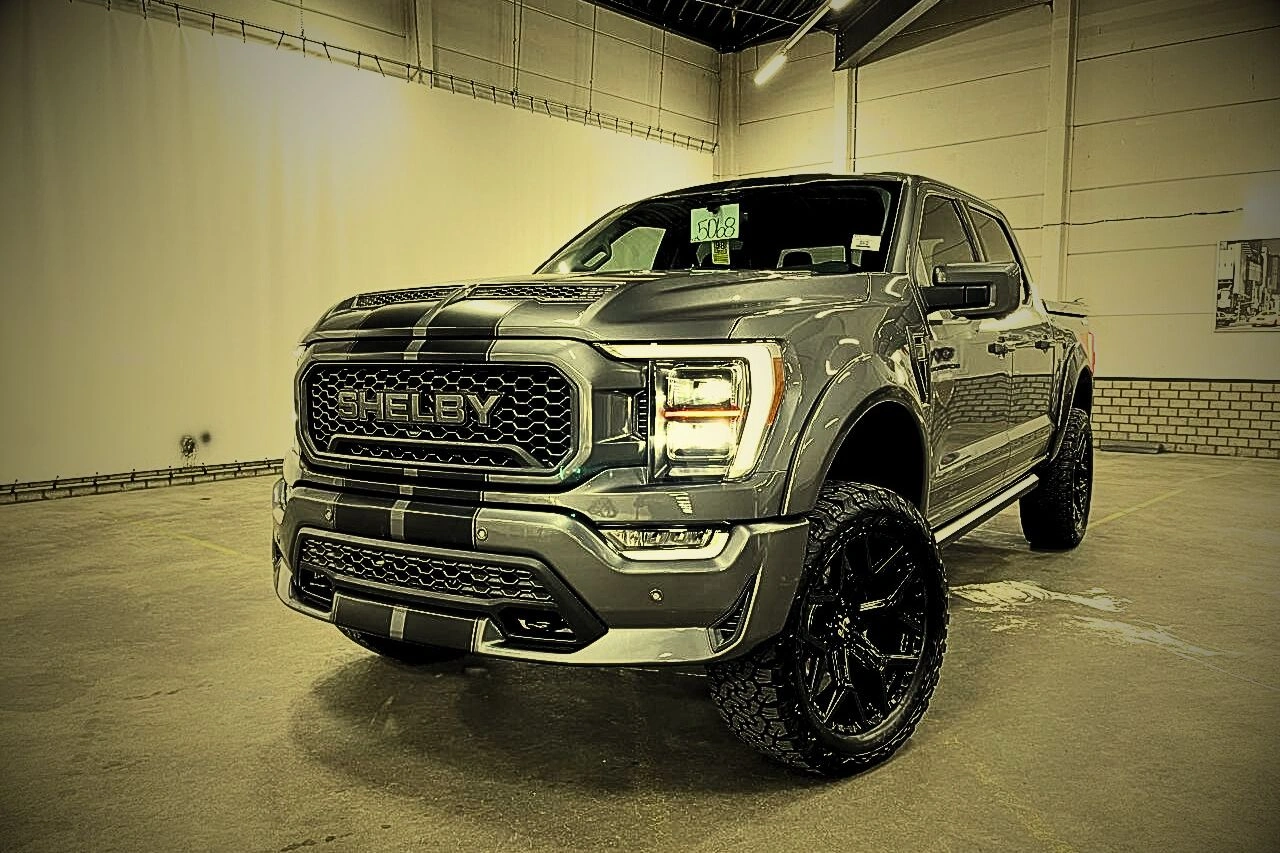 Shelby custom pickup truck in warehouse representing ultimate symbol of American muscle and performance