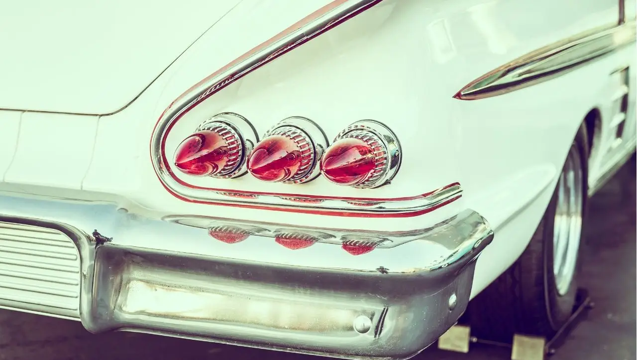 Mint green vintage American classic car tail lights close-up from muscle to luxury history now available in India