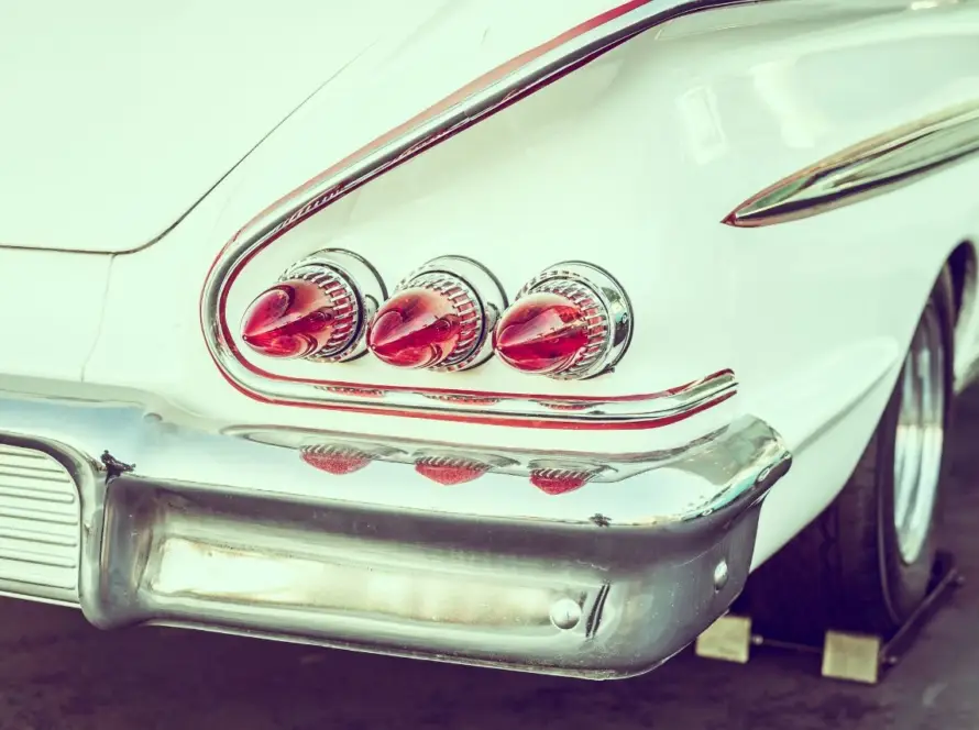 Mint green vintage American classic car tail lights close-up from muscle to luxury history now available in India