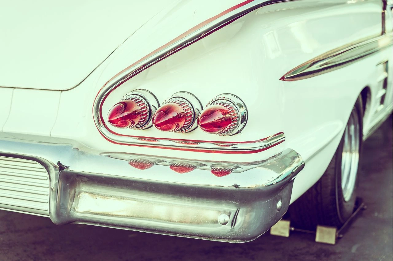 Mint green vintage American classic car tail lights close-up from muscle to luxury history now available in India