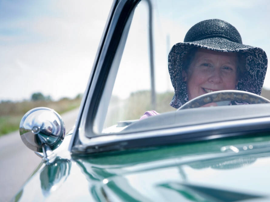 mature-lady-driving-car-2025-04-04-07-48-42-utc-890x664